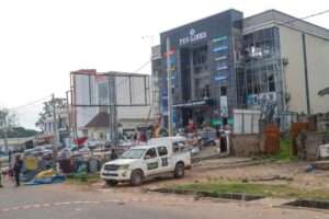 Governor Ododo assesses fire damage at PeeLinks Electronics in Lokoja